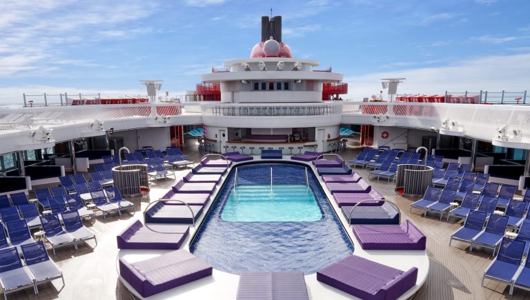 pool on top deck of a virgin voyages vessel