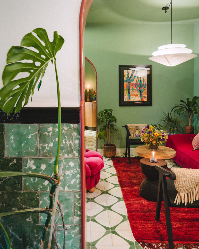 hotel san fernando hotel interior decorated with contrasting colours green and pink, featuring the building's original tiles